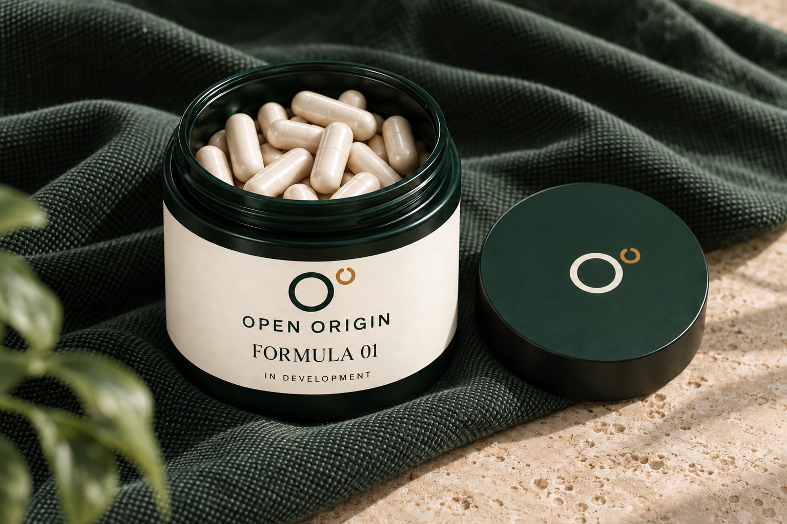 Open Origin Formula 01 packaging concept, with ivory capsules and the branded cap beside the jar.